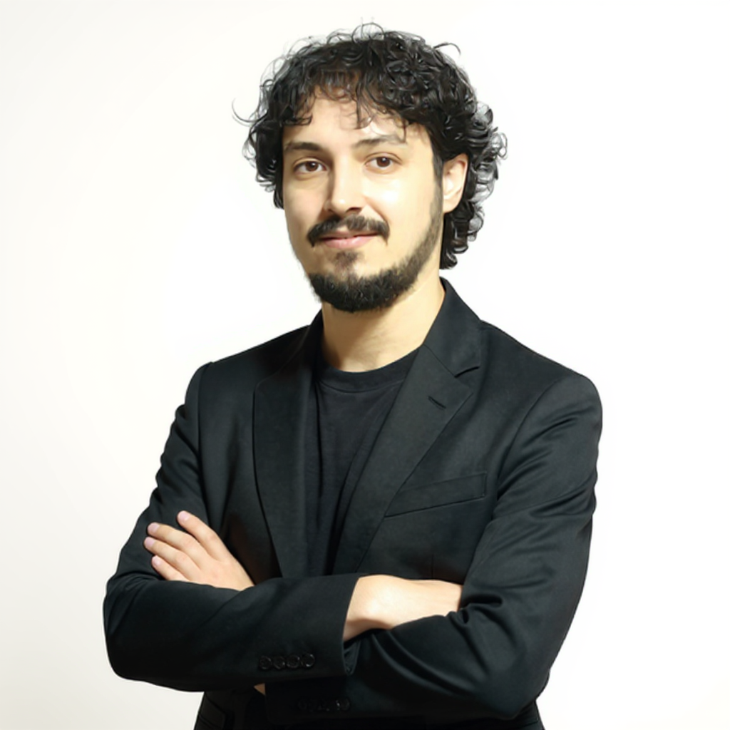 Sobre mi Caparrós Psicologo con chaqueta negra y barba.